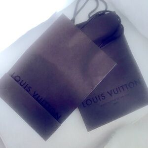 Louis Vuitton small shopping bags new if interested I have other designer bags